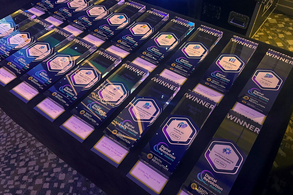 The Digital Revolution Awards trophies laid out on a presentation table