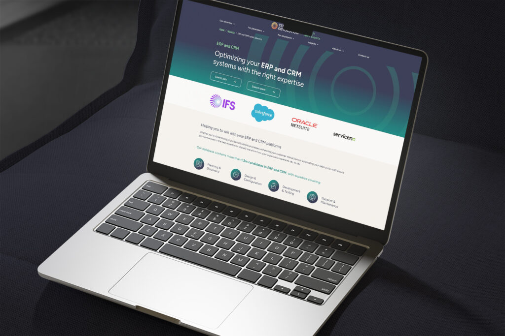 A Tenth Revolution Group webpage shown on a laptop